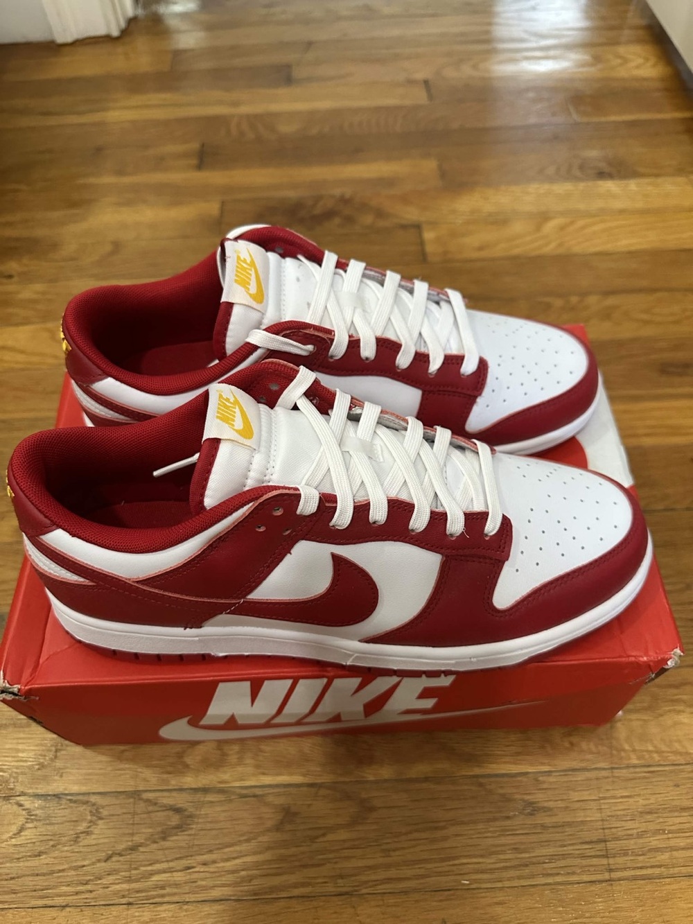 Nike Low Top Sneakers - White and Red with Gold Accents